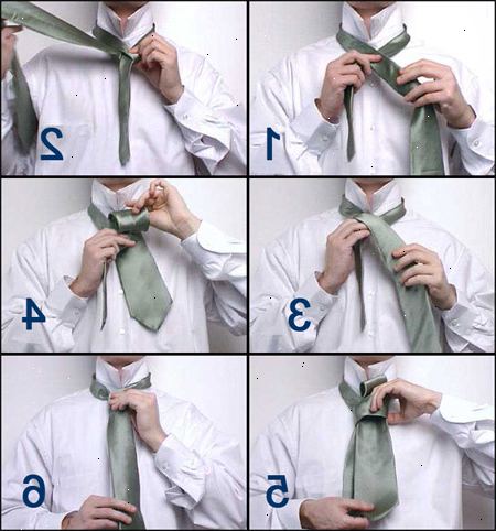 Hoe maak je een band te binden. Beweeg de brede uiteinde over het smalle uiteinde, zodat ze elkaar kruisen op de naad.